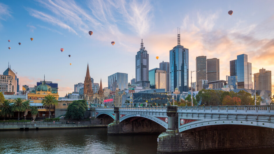 A bridge beneath the city skyline in Melbourne, Australia